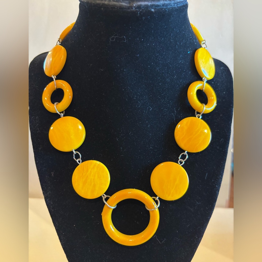 Necklace made from acrylic beads beautiful yellow. Adjustable 18”to 20”.